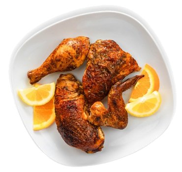 Rotisserie chicken quarter with orange wedges